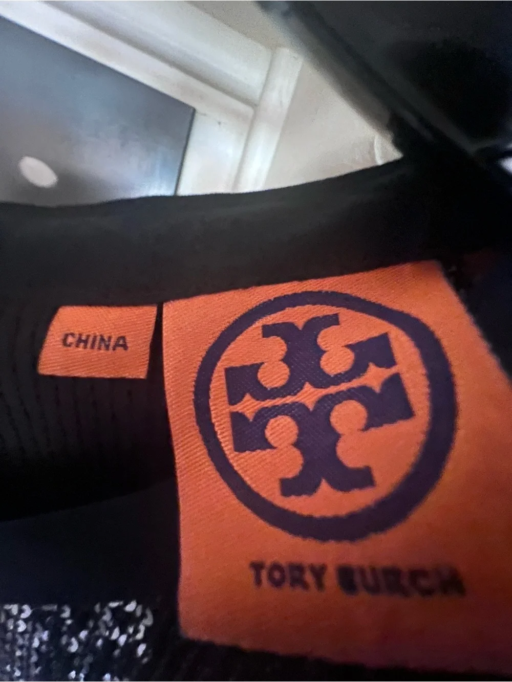 Tory Burch Black Top with Orange Logo Tag